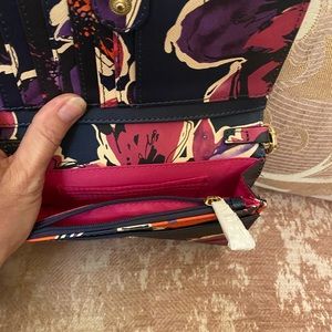 Adorable Trina Turk clutch style purse with strap and side pocket